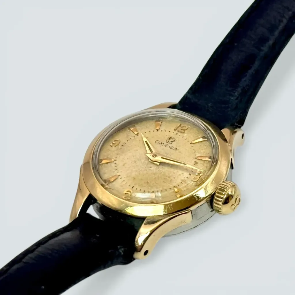 Omega dame réf. 2696-1 - bicolore acier/or - 1952